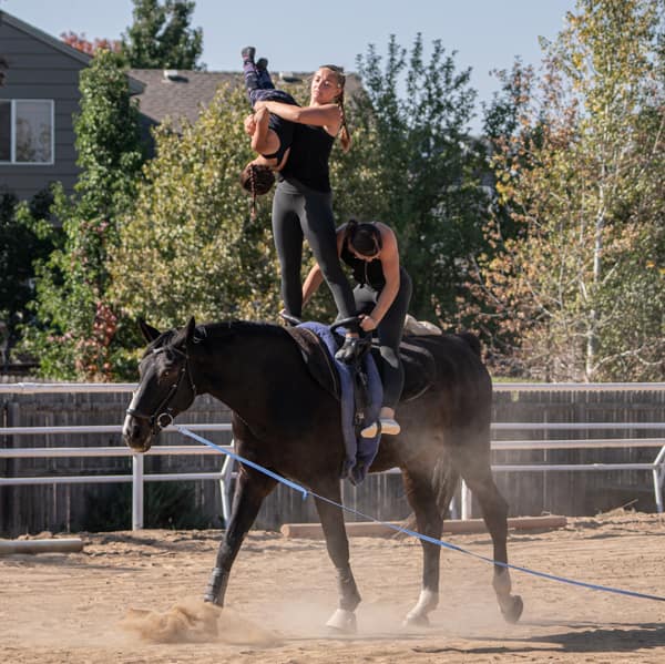Acrobats on horseback